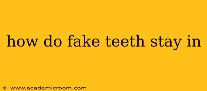 how do fake teeth stay in