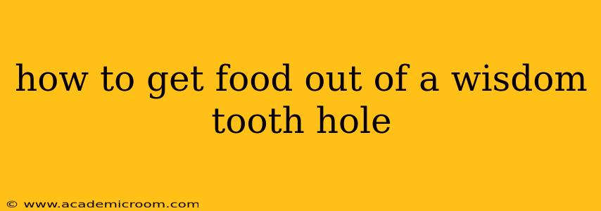 how to get food out of a wisdom tooth hole